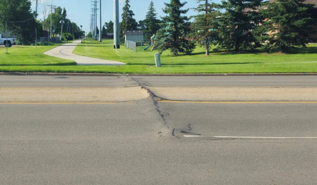 Warm temperatures caused 13th Ave. near 6 St. E. in West Fargo to buckle. (photo courtesy Grace L.)