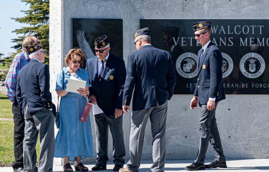 Project Leader Cheryl Anderson Talks With American Legion Members About Finishing Touches To The Wolcott Veterans Memorial 1536x984 1