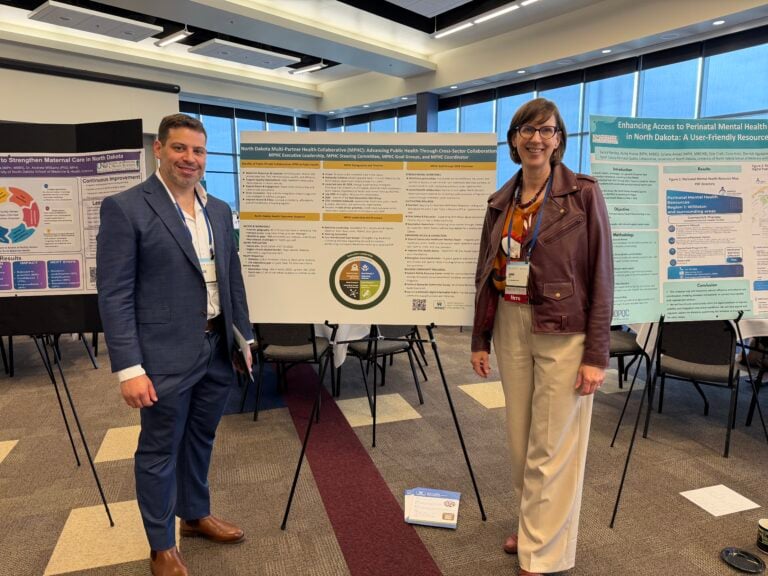 Multi-Partner Health Collaborative Steering Committee Co-Chairs Dr. Carlos Miranda and Ann Fritz present on the effort at the North Dakota Public Health Conference in Bismarck in May 2026. (Photo courtesy of Ann Fritz)