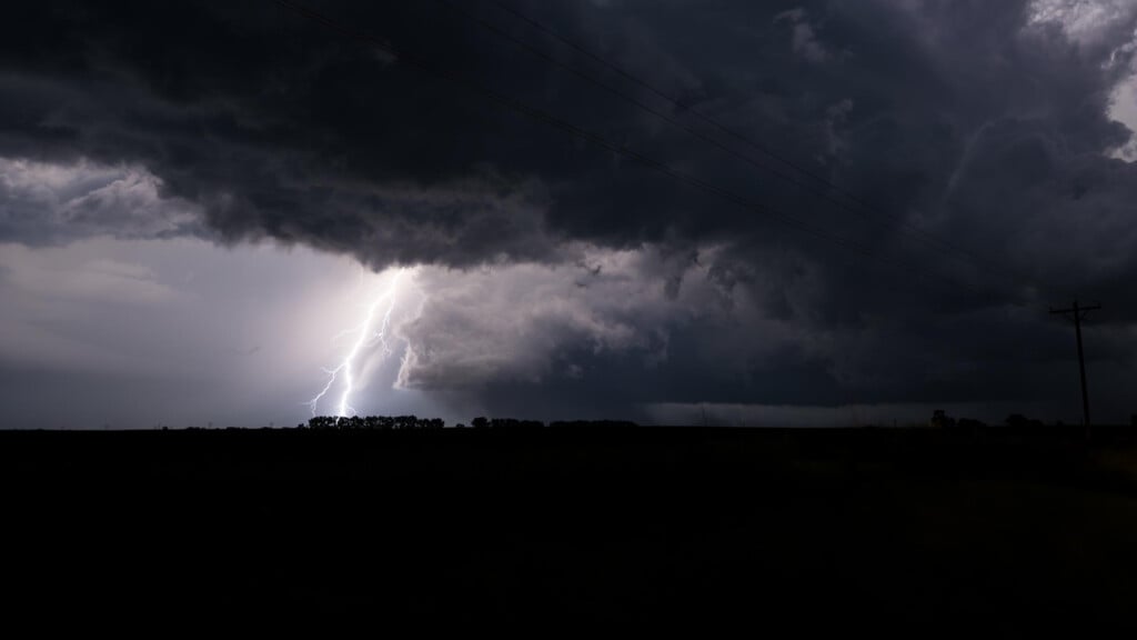The Enderlin EF-5 tornado rips fields south of town late in the day on June 20, 205