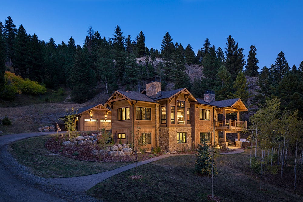 Ext At Dusk, A Family Getaway Built Into The Hillside, Brechbuhler Architects, Mountain Living Magazine