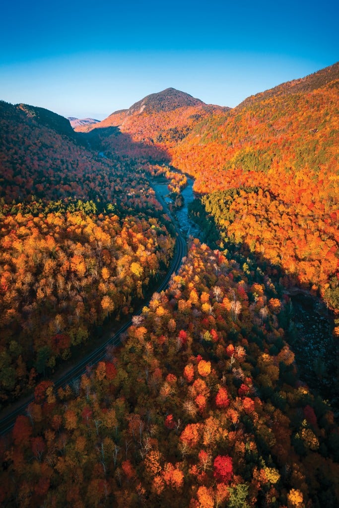 Aerial View Of Mountain Forests With Brilliant Fall Colors In Autumn, New England