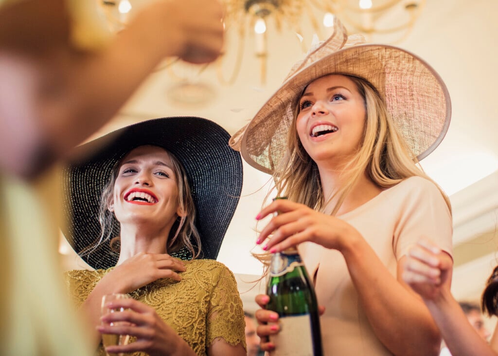 Pouring Champagne With Friends