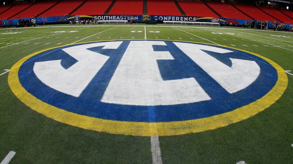 SEC logo on football field
