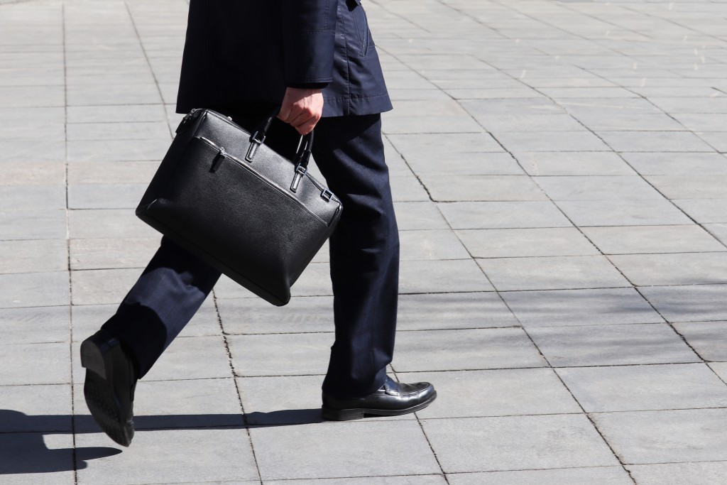 Bigstock Man With Briefcase Walking On 293193847