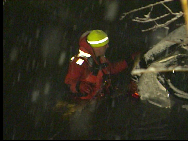 Suv Plunges Into Icy Water