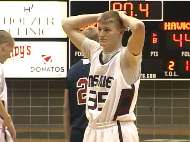 John Glenn Edged In Overtime