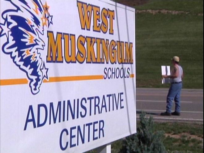 Picketers Protest West M Reading Practices