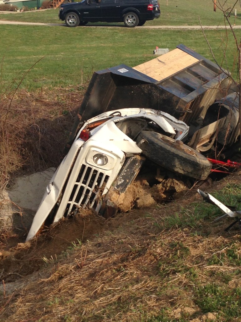Dump Truck Roll Over Pins Driver