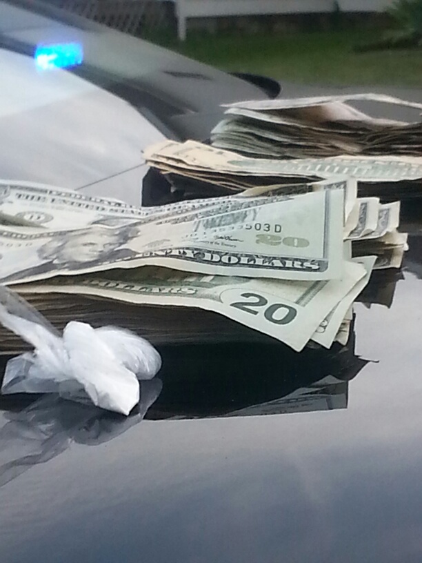Search Warrant Leads To Drugs And Weapons