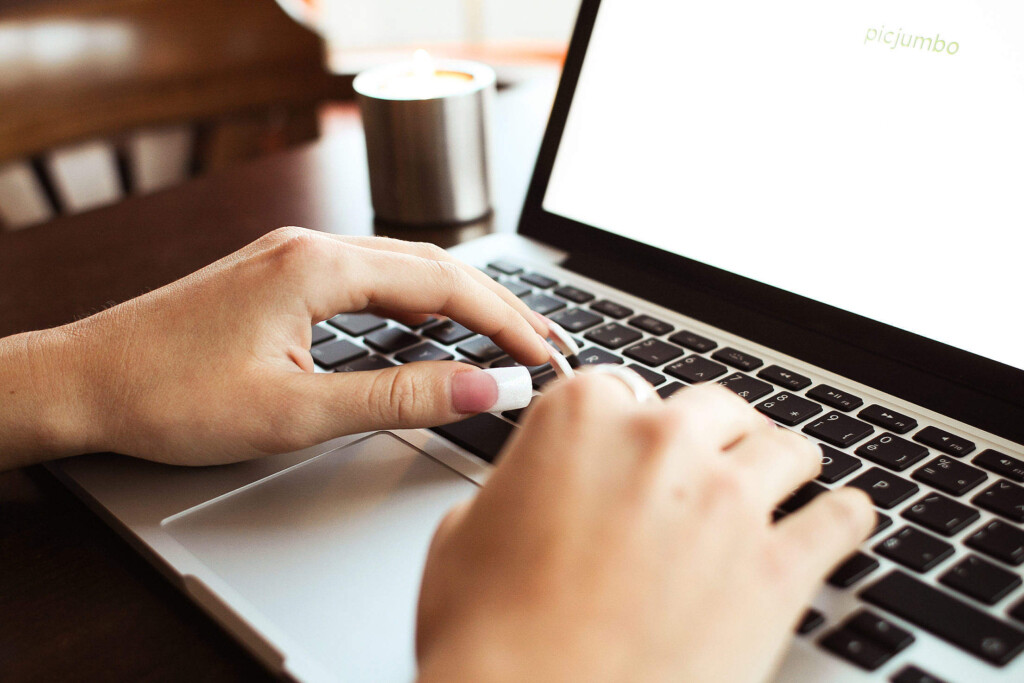 Girl Typing On Macbook 2210x1473