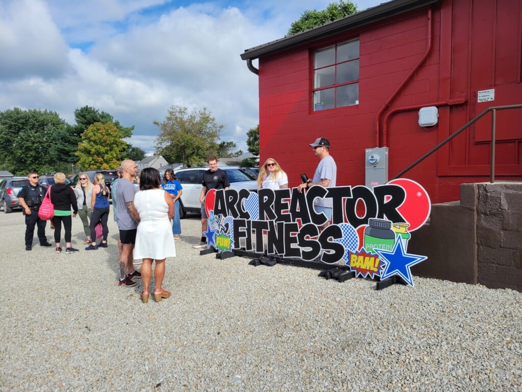 Members, trainers and community members join the celebration for Arc Reactor Fitness' grand opening. The community-based gym is located in Zanesville on Grove Avenue.