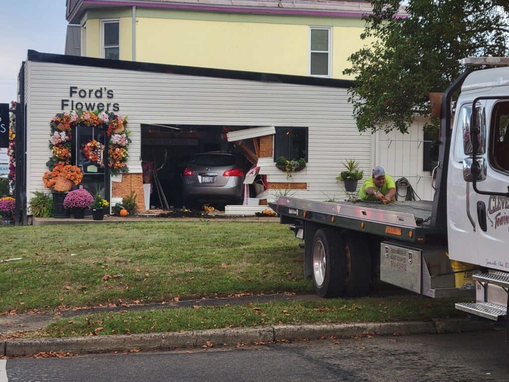 The store front of Ford's Flowers on the corner of Locus and Maple Avenues where a car crashed into the building.