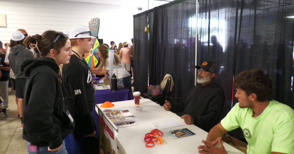 High school students meet local businesses to learn about potential careers in the community.