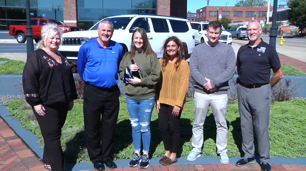 Ashley Adams was presented with a flag made by Annin Flag Company in Coshocton, Ohio. Adams is this weeks winner of WHIZ's Military Salute and owner of the Headley Inn Winery.