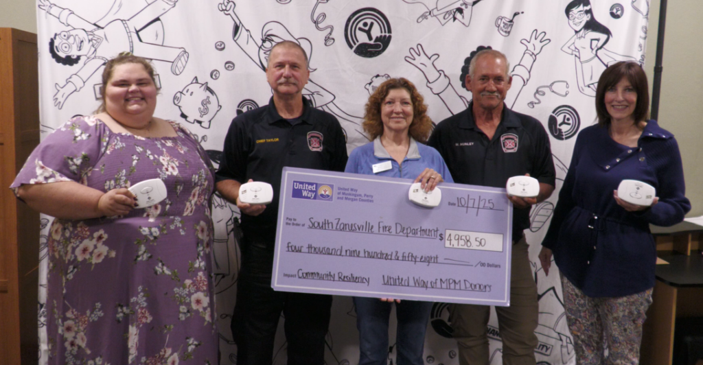 The United Way presents the South Zanesville Fire Department with funding to supply Muskingum County homes with carbon monoxide detectors.