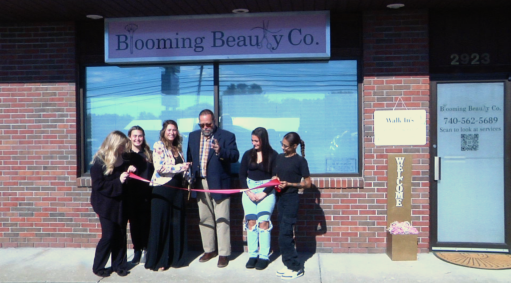 The ribbon cutting ceremony at Blooming Beauty Co. held on Friday.