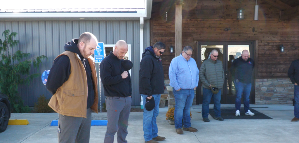 Ables Inc. on Veterans Day held a moment of silence around the flag pole before announcing the winners of their Heat for Heroes furnace giveaway.