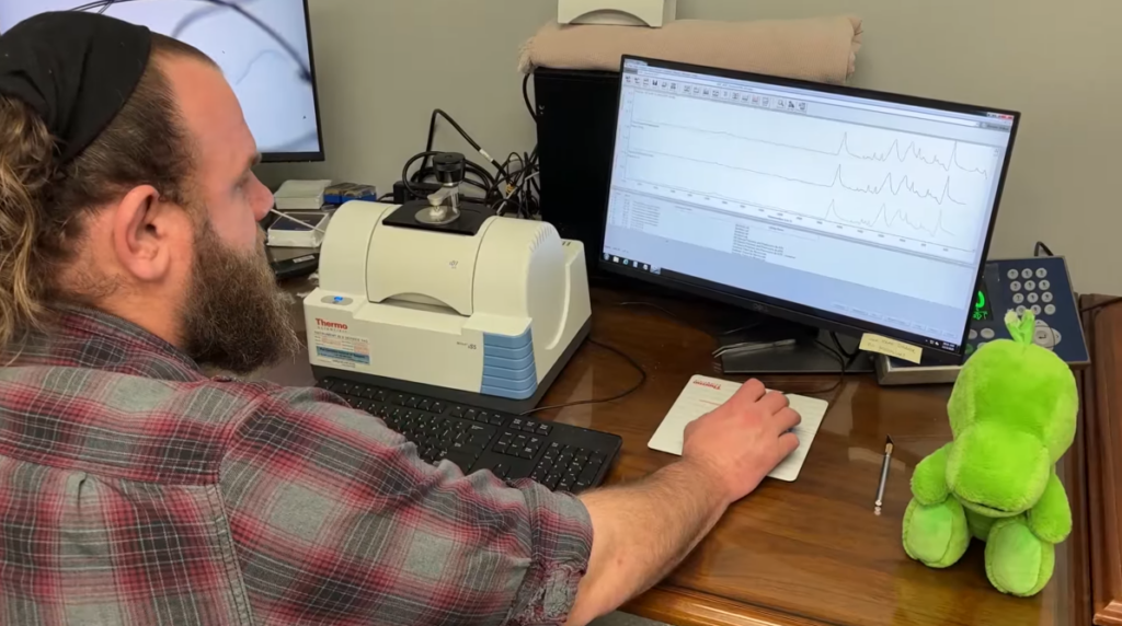 An employee with the Ohio Department of Commerce's Division of Industrial Compliance is analyzing the stuffing from a stuffed animal. The department tests the material and components to ensure a child's safety.