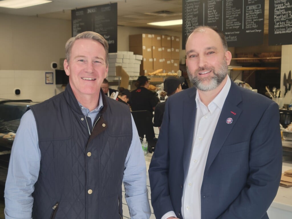 Senator Jon Husted (R) and Adrian Adornetto standing in Giacomo's Bread and More, owned by Adornetto. The senator came to Zanesville to discuss the impacts of the tax cuts on tips and overtime.