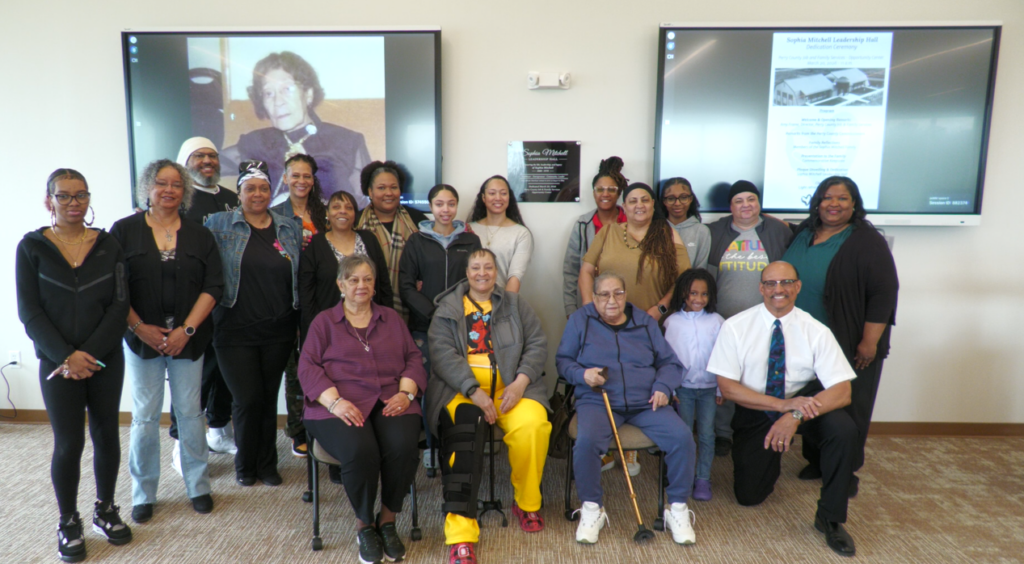 Grandchildren, great grandchildren, and great great grandchildren of Sophia Mitchell stand in front of the plague dedicated to her. Mitchell was the first African American Woman in Ohio to serve as mayor in Rendville.
