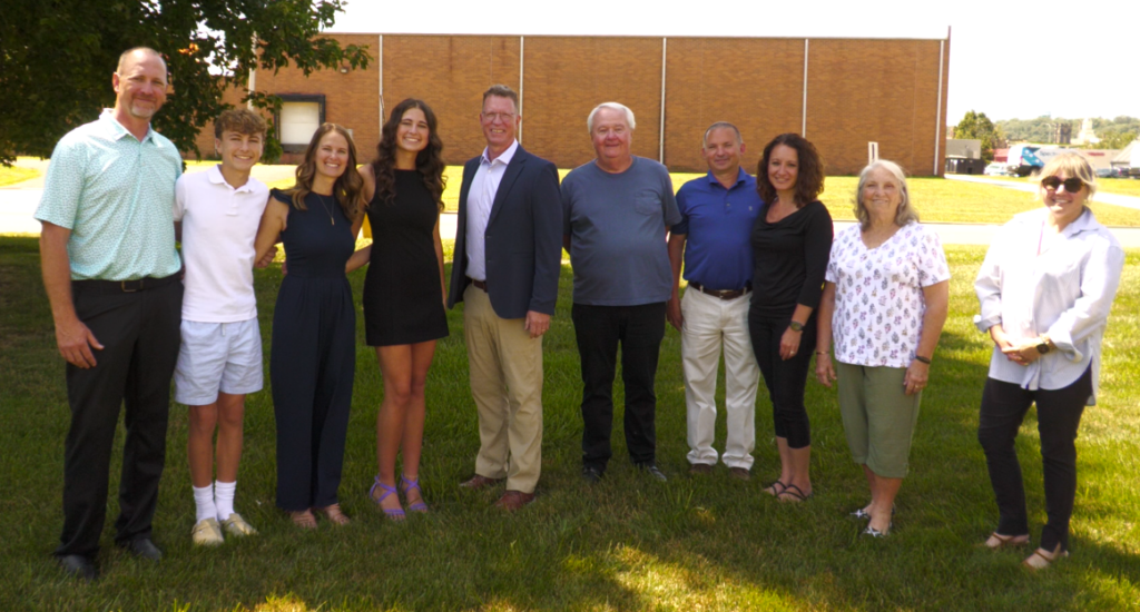 Emma Swope and her family joined by members of the Dreier family and the Columbus Foundation. They all came together to celebrate Swope who had received a scholarship worth $40,000.