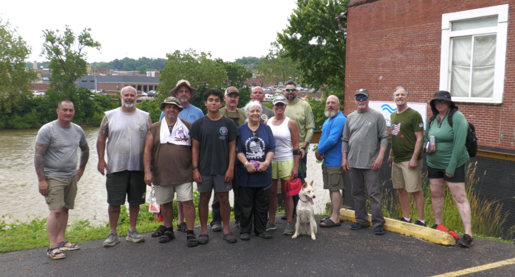 Paddle for Heroes Memorial Paddle participants pause for a photo before lunch at Muddy Misers.