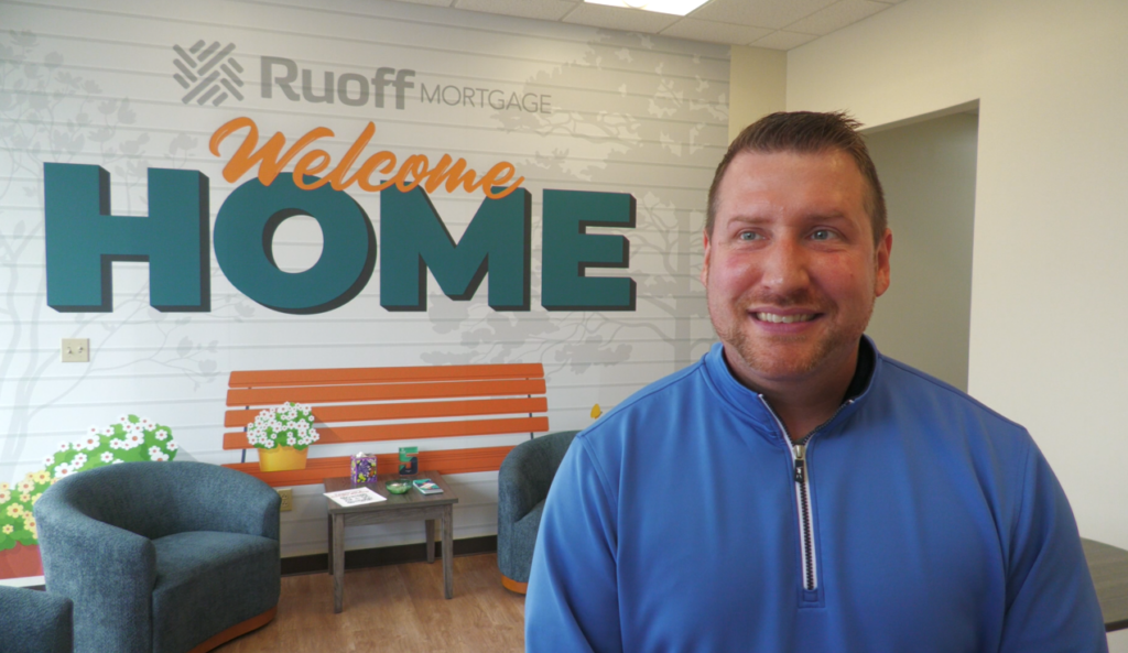 Rusty Darner is the branch manager and Zanesville office vice president for Ruoff Mortgage. Darner is standing in the lobby of their new location.
